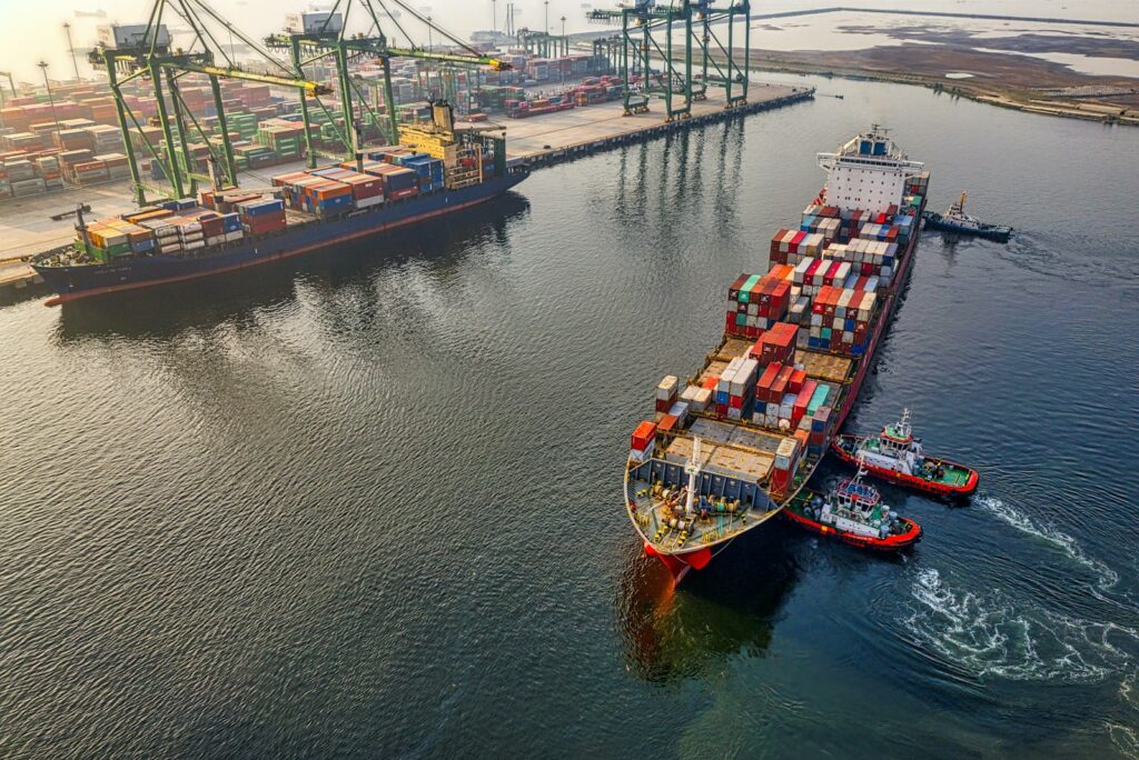 Container ship being loaded at port